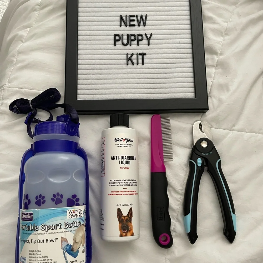 New puppy dog pet kit water bottle flea comb nail clippers antidiarrhea medicine